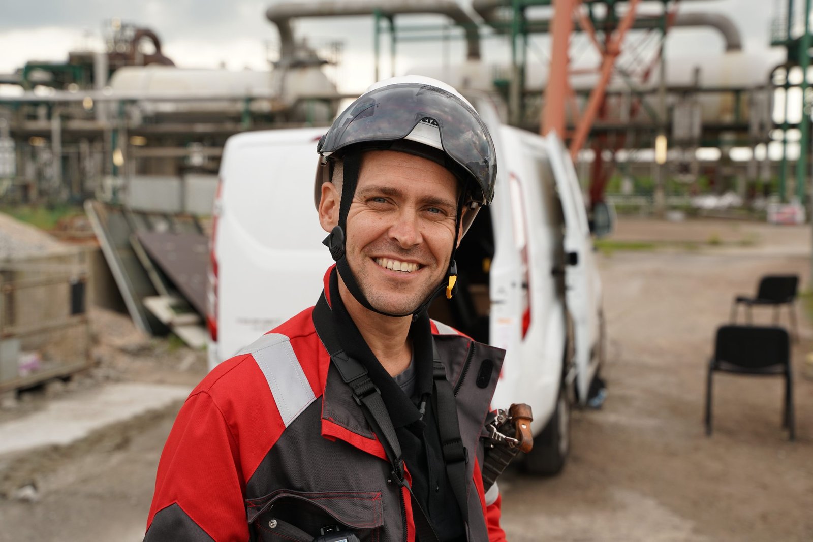 Dennis Vetters on radio while flying a drone on site